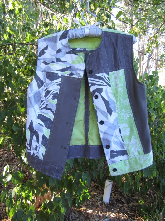 Green, white and grey scrappy vest