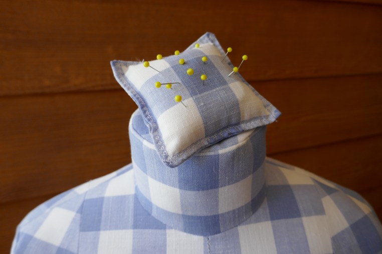 pincushion on top of dress form